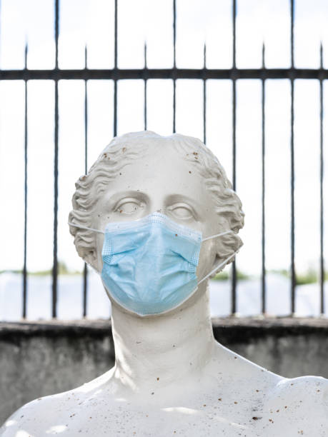 istock A statue masked by covid-19 1319983062