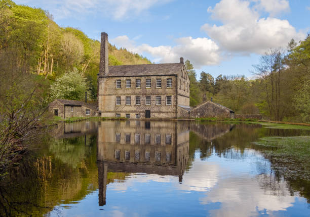 istock Gibson mill Hardcastle Craggs Hebden bridge  blue reflections 1319984601