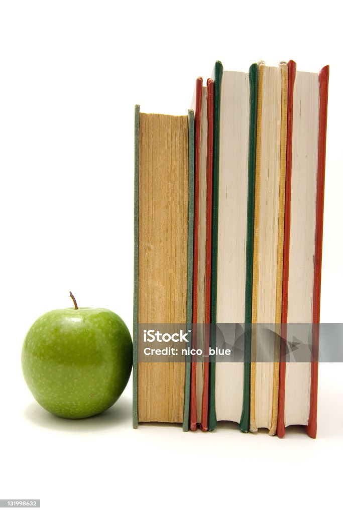 Libros y manzana - Foto de stock de Alimento libre de derechos