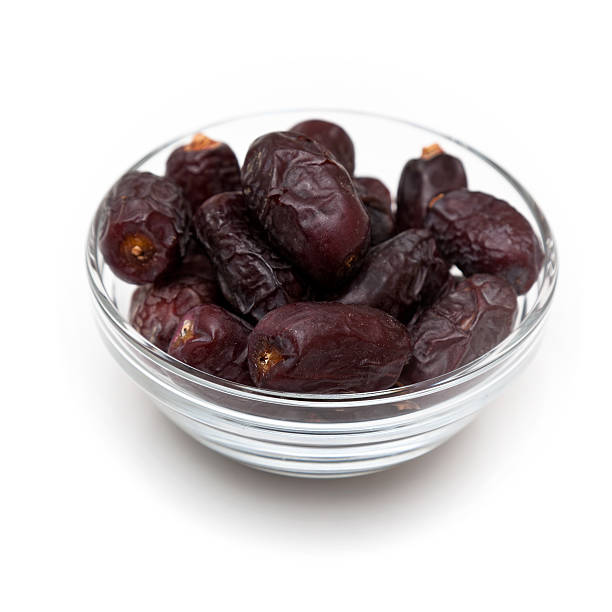 Dates in a bowl stock photo