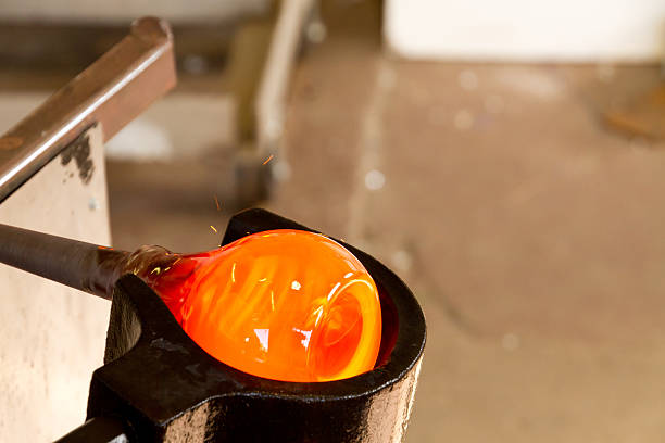 Molten glass molded with wooden tool