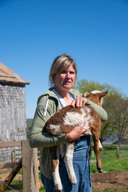 istock A woman on her small scale farm. 1319991675