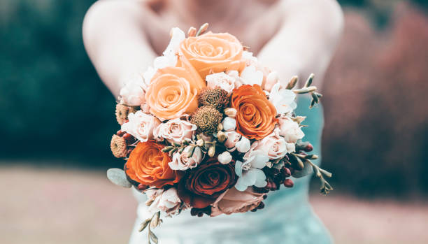 istock Bride holdin bouquet - retro styled photo 1319993769