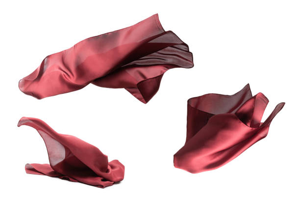 istock Flowing red silk scarf isolated on white background. 1319993866