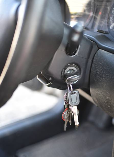 istock ignition key in the lock of an older car 1319993891