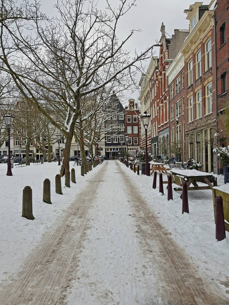 istock Snowy city Amsterdam in winter in the Netherlands 1320005206