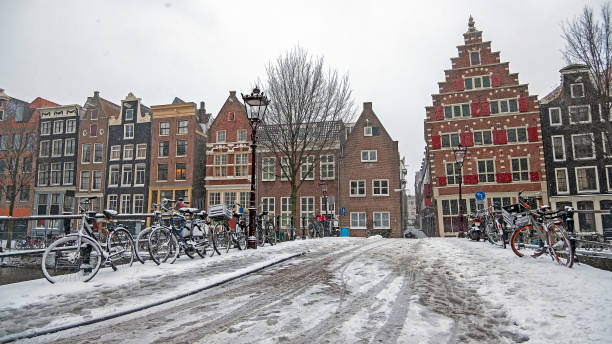 istock Snowy city Amsterdam in winter in the Netherlands 1320005331