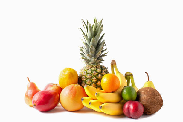istock Tropical fruits assortment isolated on white background. Pineapple, coconut, bananas, mango, apple, lime, lemon, grapefruit and plum. 1320007199