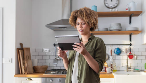 istock Woman Having A Video Conference From Her Home 1320011393