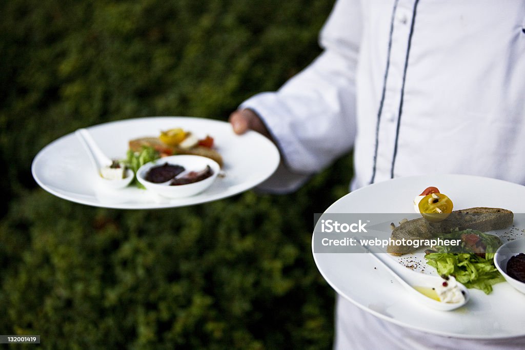 Serving dinner Serving dinner, selective focus, canon 1Ds mark III Adult Stock Photo