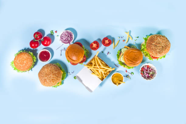 istock Various burgers set on blue background 1320014499