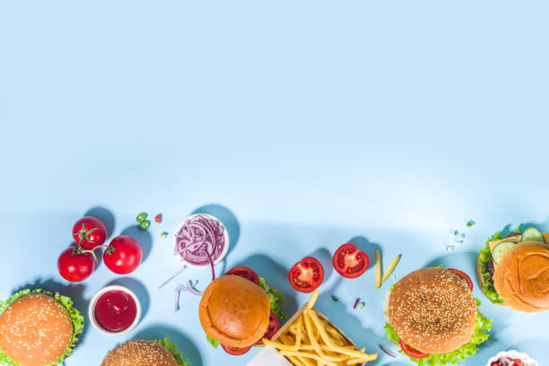 istock Various burgers set on blue background 1320014500