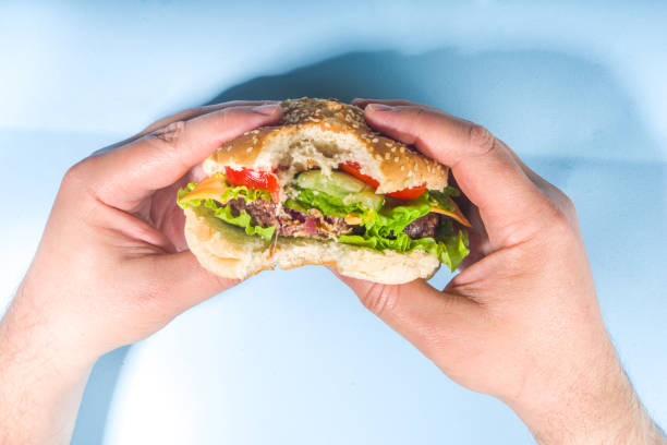 istock Various burgers set on blue background 1320014517
