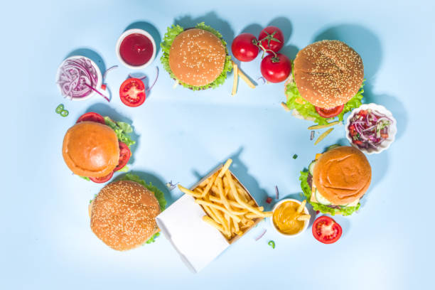 istock Various burgers set on blue background 1320014519