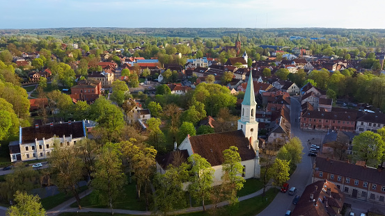 Aerial View of Kuldiga Old Town With Red Roof Tilesand Evangelical Lutheran Church of Saint Catherine in Kuldiga, Latvia.
