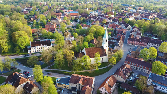 Aerial View of Kuldiga Old Town With Red Roof Tilesand Evangelical Lutheran Church of Saint Catherine in Kuldiga, Latvia.