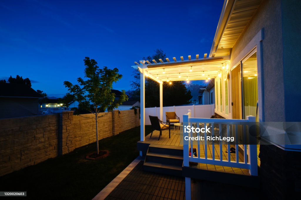 Backyard Deck and Pergola A backyard of a suburban USA home with a deck and pergola. Gazebo Stock Photo