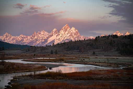 Sunrise on the Buffalo Fork and the Grand Teton National Park in Wyoming, western USA, Nearest city is Jackson Hole, Wyoming.