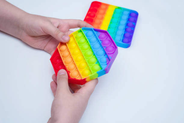 Children's colorful anti-stress game made of silicone for the development of the mind and relaxation. stock photo
