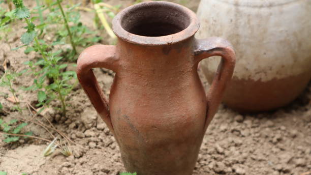 istock Brown clay pots on the soil in Cappadocia, Turkey 1320035256