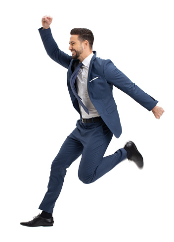 Young successful manager jumping in the air, isolated on white background