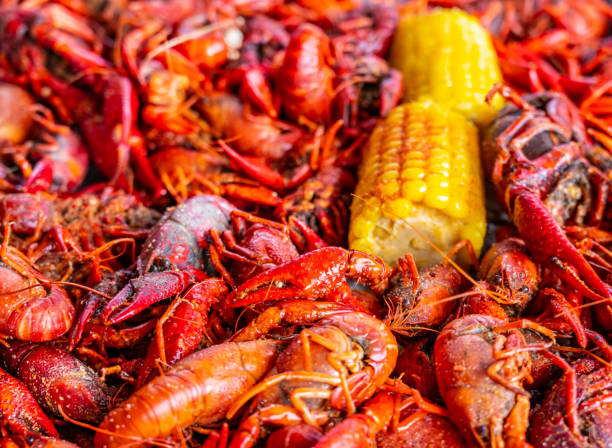 istock Boiled Crawfish with Yellow Corn on the Cob 1320040218