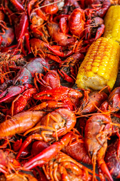 istock Boiled Crawfish with Yellow Corn on the Cob 1320040379