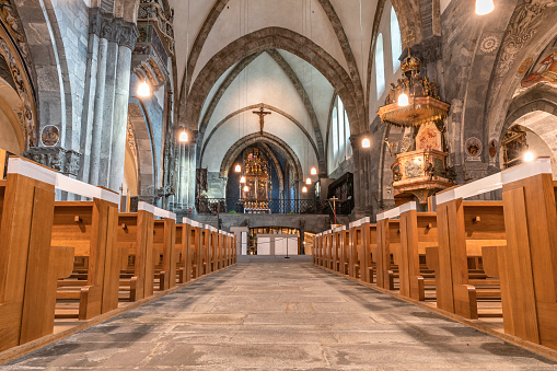Chur, Switzerland - February 19, 2021: Interior of the catholic cathedral in Chur, the oldest town in Switzerland and the capital of the Swiss canton of Graubunden.