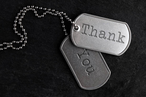 old military dog tags - thank you - army usa text metal imagens e fotografias de stock