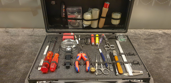 Toolbox set of wrenches, car mechanic tools in repair kit case with pliers, scissors, tweezers, screwdrivers, magnifying glass ...