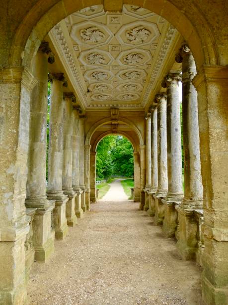 istock Ancient arches in a park in Stowe in England 1320043212