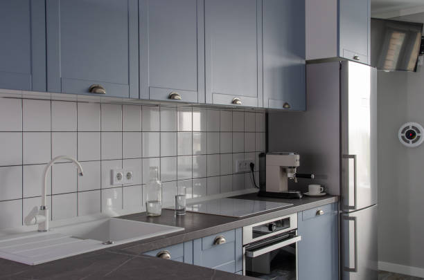 istock Minimalistic Scandinavian blue-gray kitchen. Clean background 1320044400