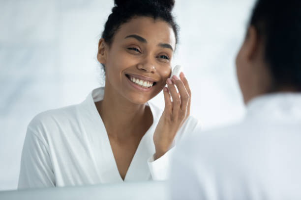 istock Happy cosmetic product consumer satisfied with moisturizing cream 1320049952
