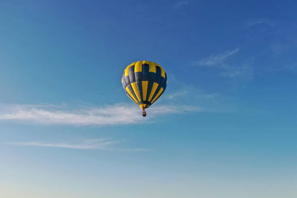 istock Hot air balloon in flight 1320053787