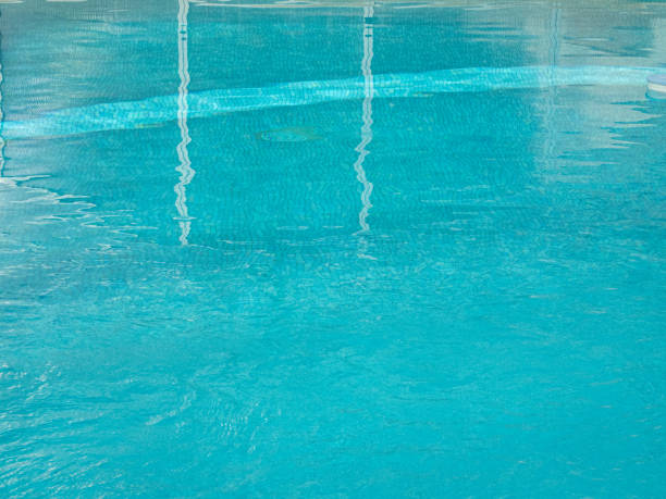 istock Clear blue water in a swimming pool 1320054721