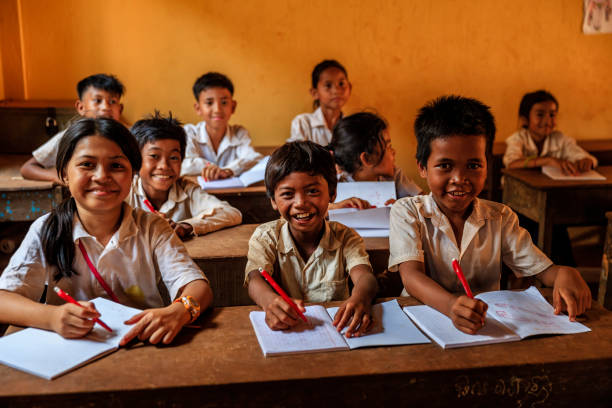 istock Cambodian school children during class, Tonle Sap, Cambodia 1320054820