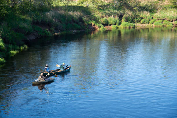 istock Fisherman canoeing in the Annapolis River, Nova Scotia 1320056611