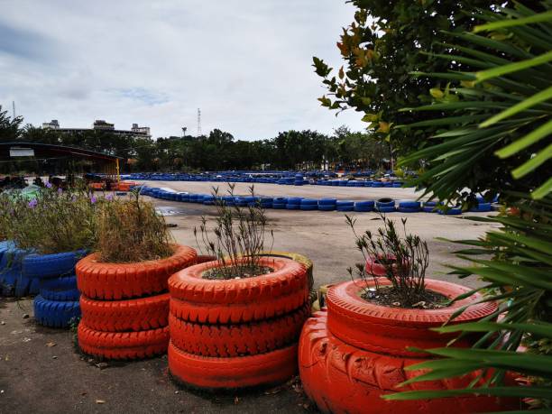 istock Used tires as a flower pot 1320056682