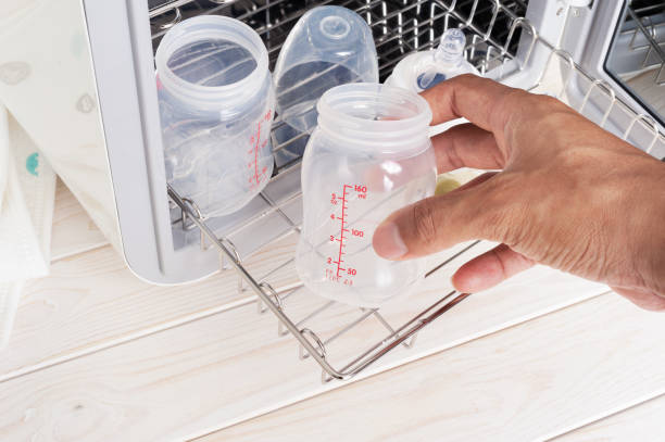 sanitizing the baby things in UV Sterilizer stock photo