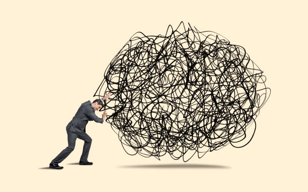 istock Man Attempts To Push Troubles Away 1320073197