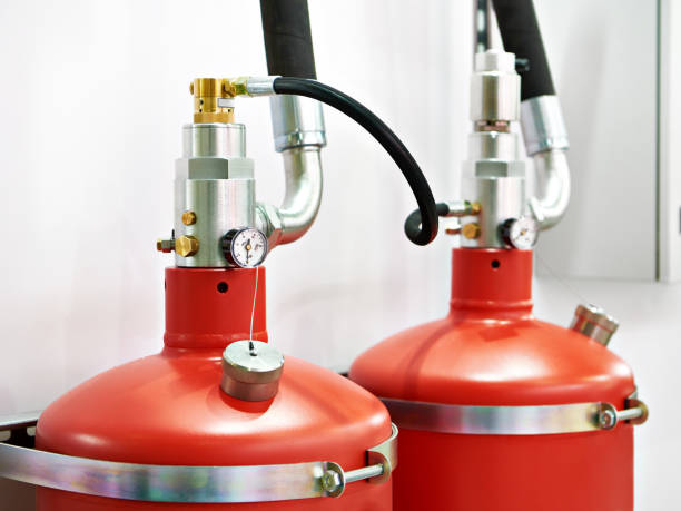 Gas extinguishing modules Gaseous fire suppression modules storage containers with shut-off device and valve repression stock pictures, royalty-free photos & images