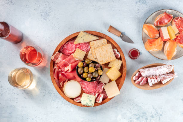 istock Charcuterie and cheese board, overhead flat lay composition with copy space 1320096005