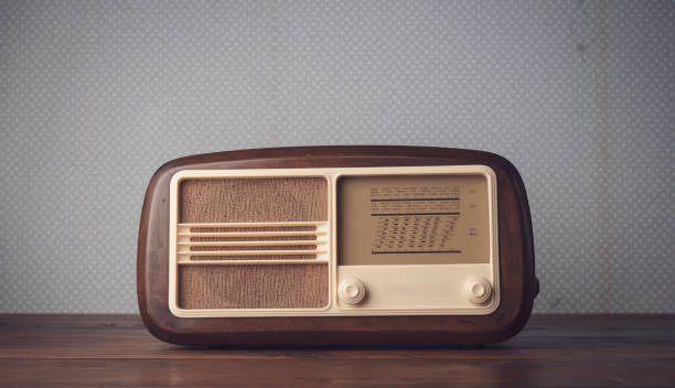 istock Vintage radio and retro wallpaper 1320097120