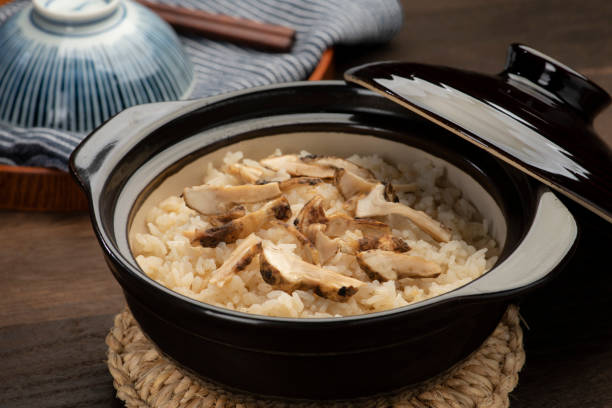 Matsutake mushroom rice. The taste of autumn in Japan. Matsutake mushroom rice. The taste of autumn in Japan. matsutake mushroom stock pictures, royalty-free photos & images