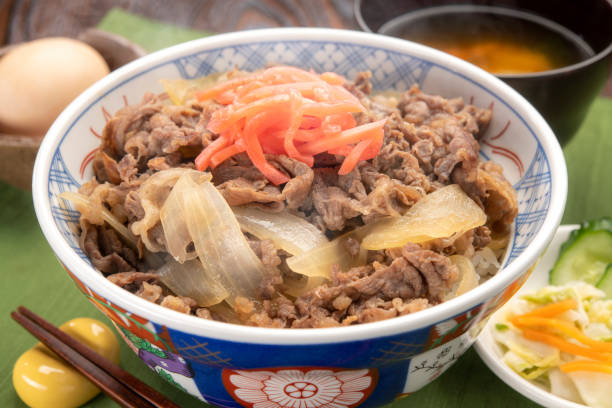 istock Gyudon or beef bowl. Cooked beef and onions on rice bowl. 1320100320