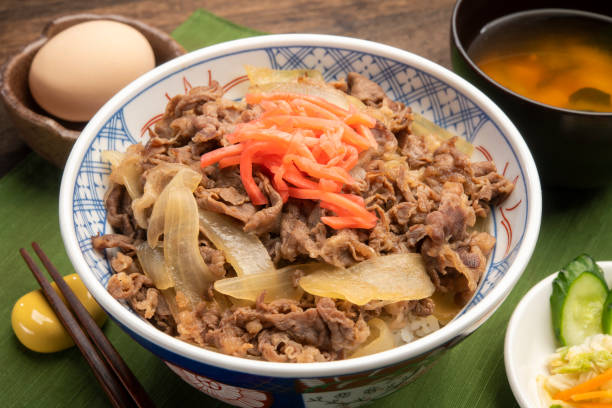 istock Gyudon or beef bowl. Cooked beef and onions on rice bowl. 1320100368