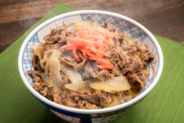 istock Gyudon or beef bowl. Cooked beef and onions on rice bowl. 1320100388