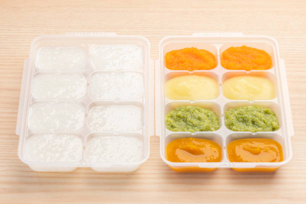 istock Homemade baby food with mashed vegetables 1320101313