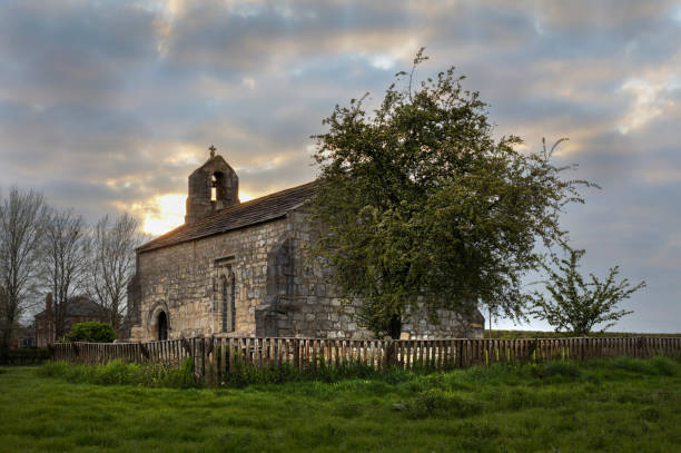 istock Ancient Medieval Church In England 1320105806