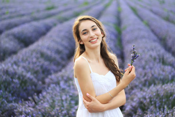 istock Young girl in lavender field 1320111383